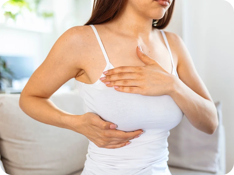 young caucasian woman palpating her breast by herself that she concern about breast cancer healthcare breast cancer concept 3